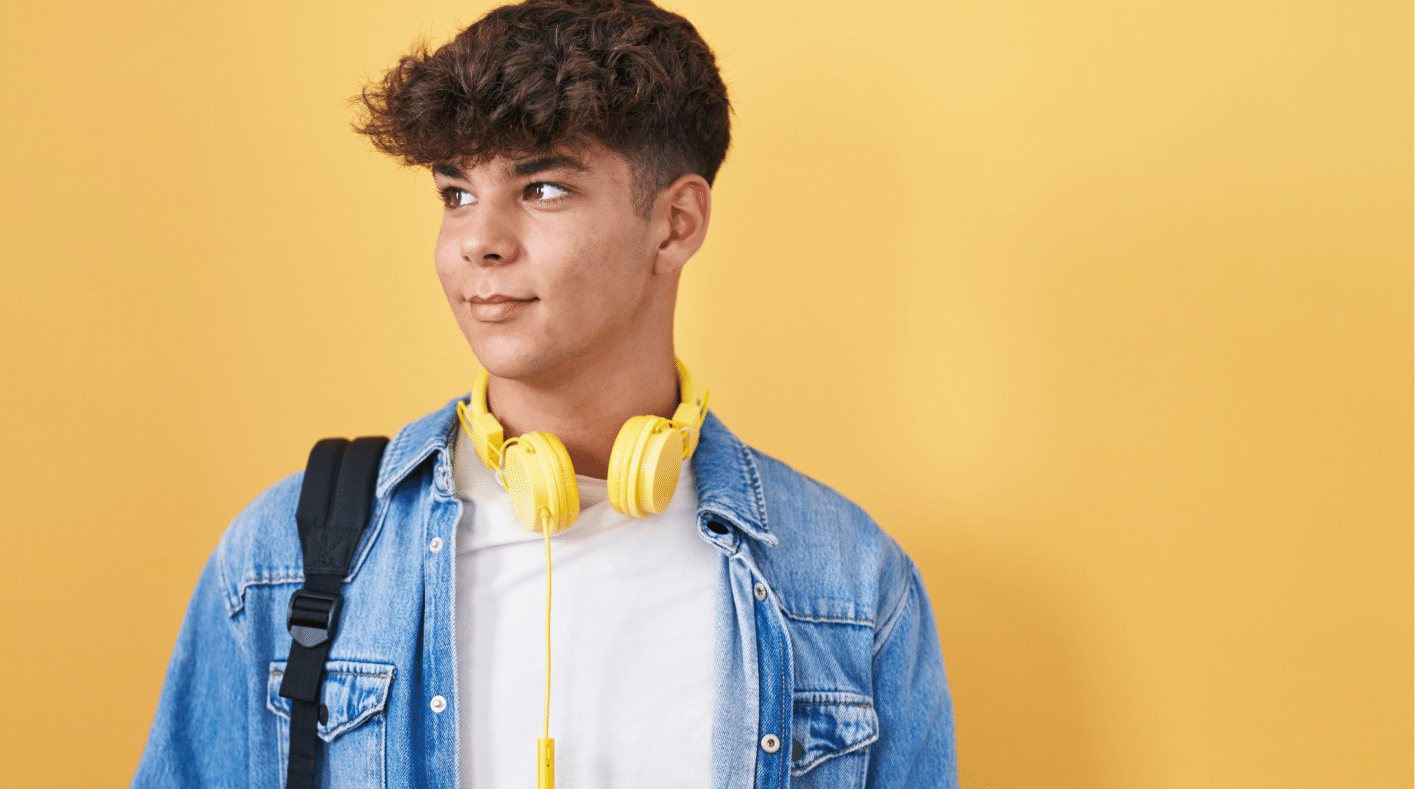 hispanic-teenager-wearing-student-backpack-holding-books-smiling-looking-side-staring-away-thinking