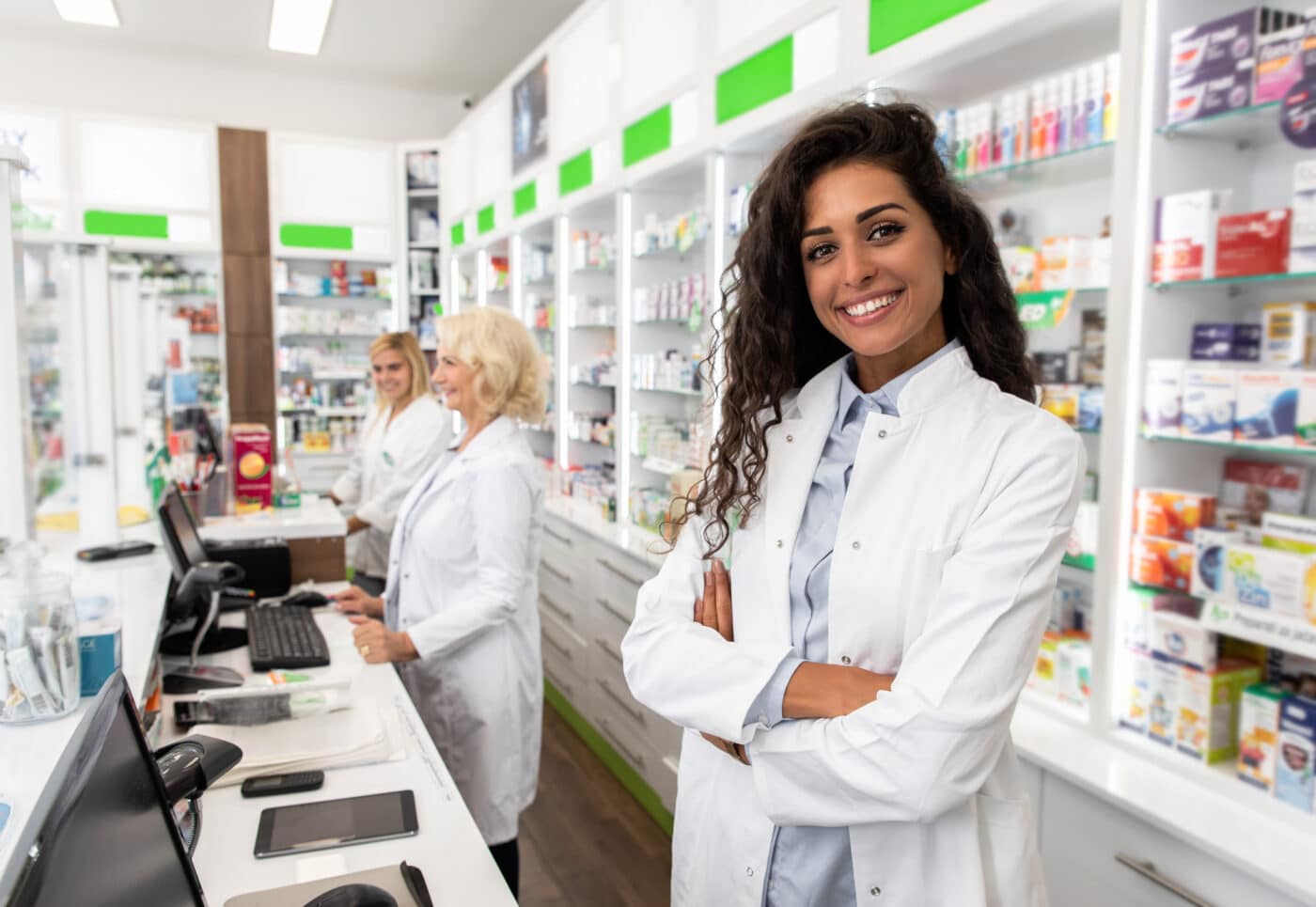 Portrait of female pharmacist in drugstore.