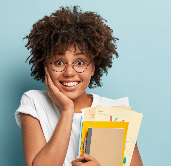 pleasant-looking-afro-american-woman-holds-notepads-papers-studies-college-glad-finish-studying